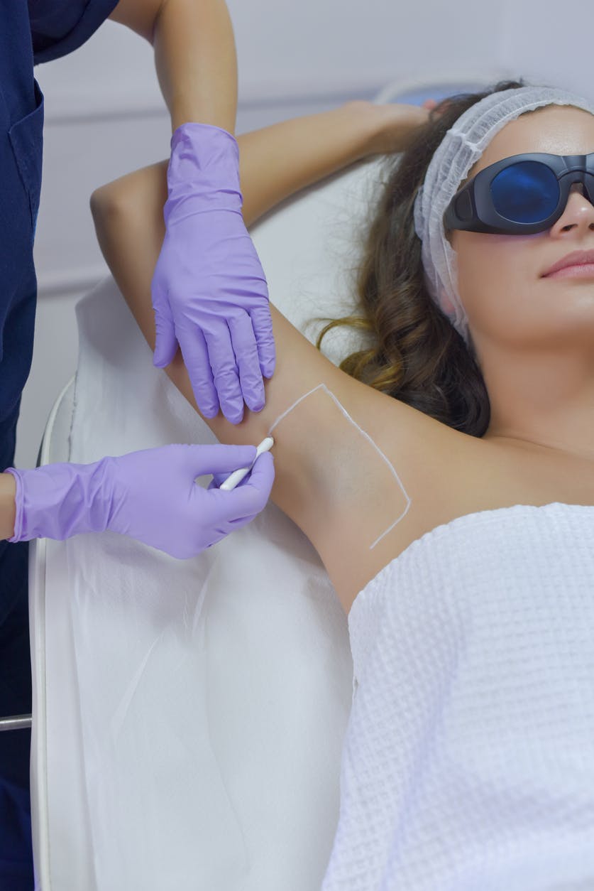 Woman preparing for laser hair removal